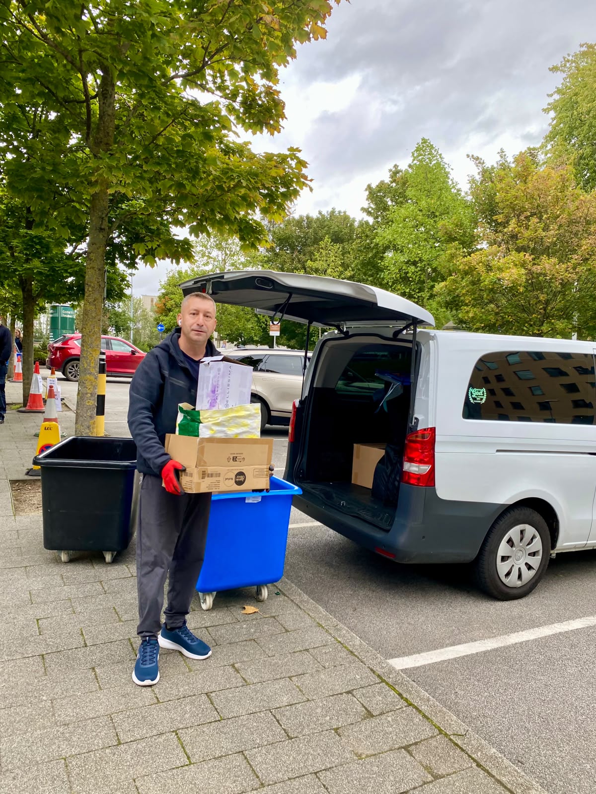 Student move unloading boxes from Mercedes Vito in Leeds